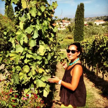 Valeria checking out the grapes!